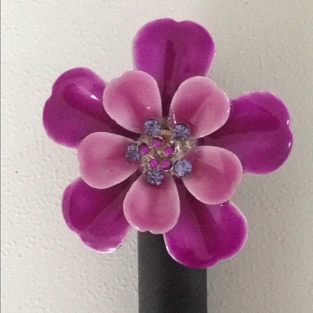 Ring With A 2 Inch Purple Flower With Crystals